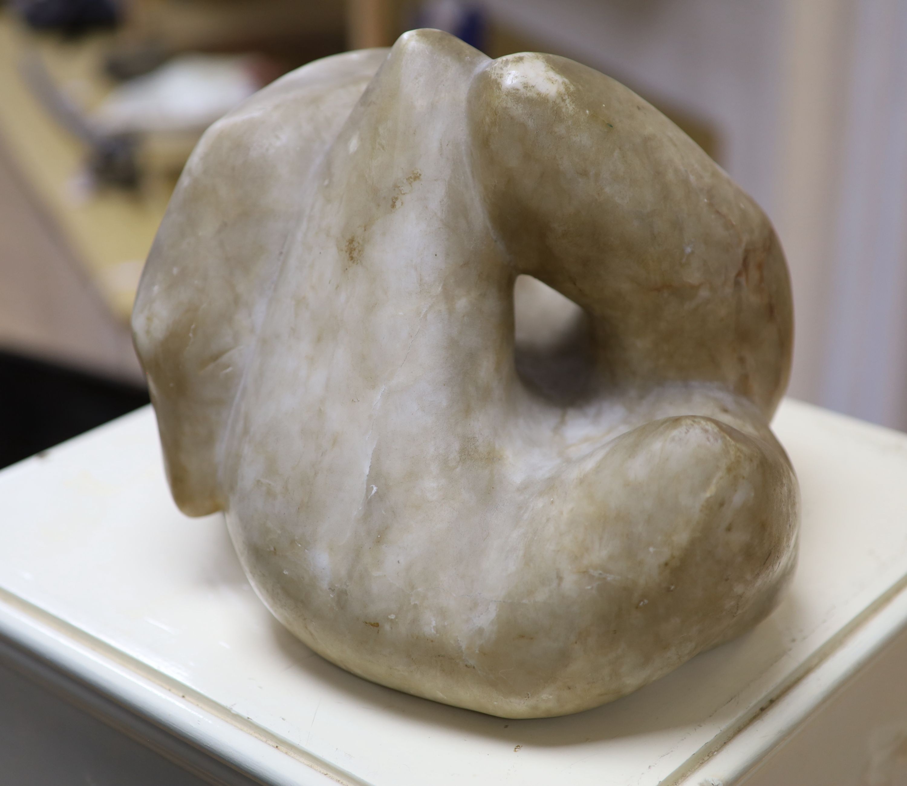 Wilby Hart, alabaster sculpture, abstract form, W. 33cm. H 32cm., on a painted wood pedestal.